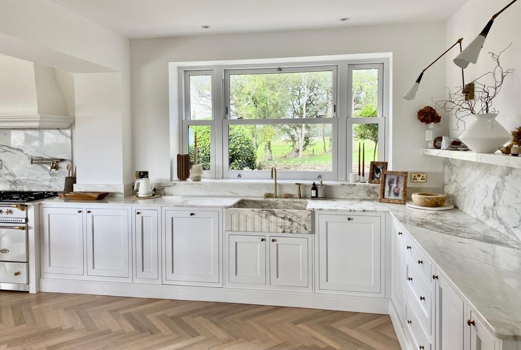 After — Calacatta marble · country kitchen restoration